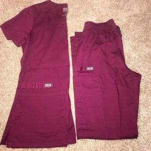Three pairs of xs Cherokee scrubs!